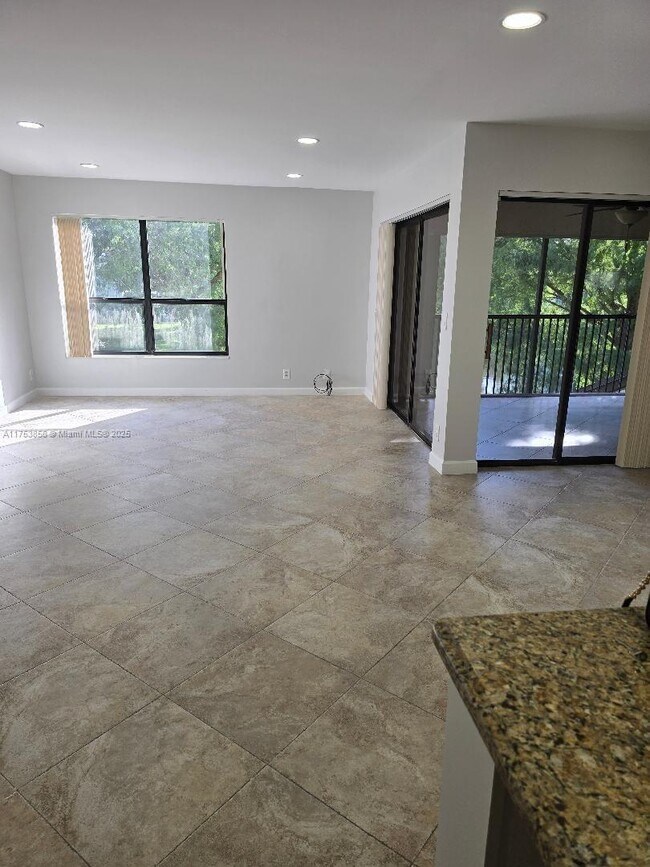 Building Photo - 3299 Cocoplum Cir