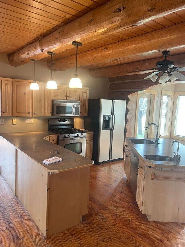 Building Photo - Charming Log Home For Rent with Large Shop & Spacious Yard