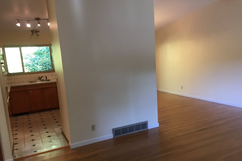 Open area showing Living Rm opening to kitchen - 8700 25th Ave NE