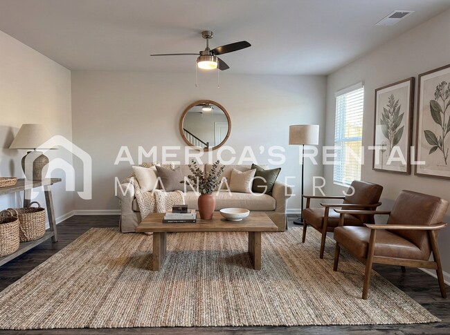 Building Photo - Spacious Two-Story Townhome with Open Layout!