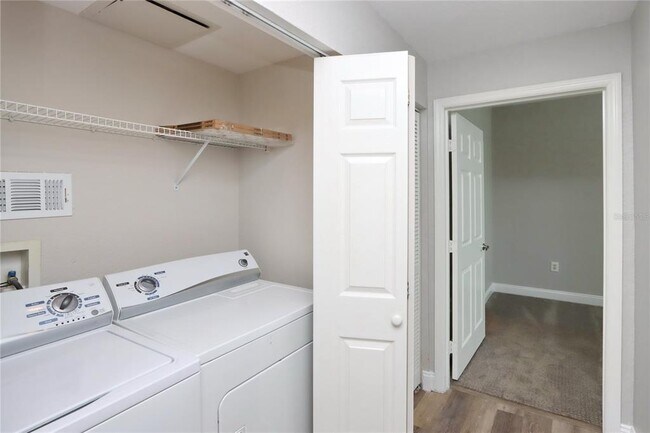 Building Photo - 9088 Lake Chase Island Way