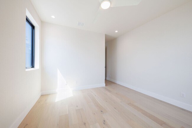 Building Photo - Luxury Redefined: Experience Vibrant Living in this 3-Bedroom Haven in East Austin