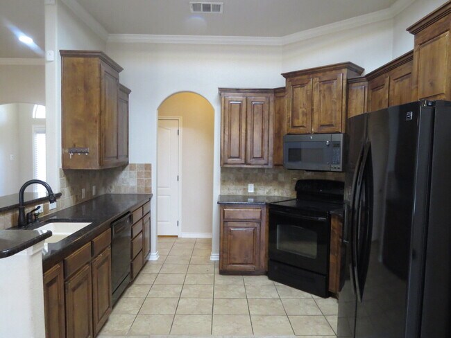 Building Photo - "Spacious 4-Bed Oasis in Killeen with Granite Touches & Cozy Fireplace!"