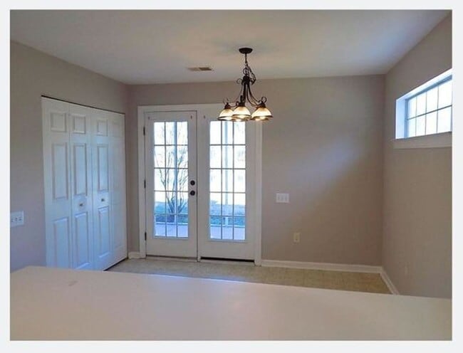 Building Photo - Spacious Condo with Expansive Pond Views