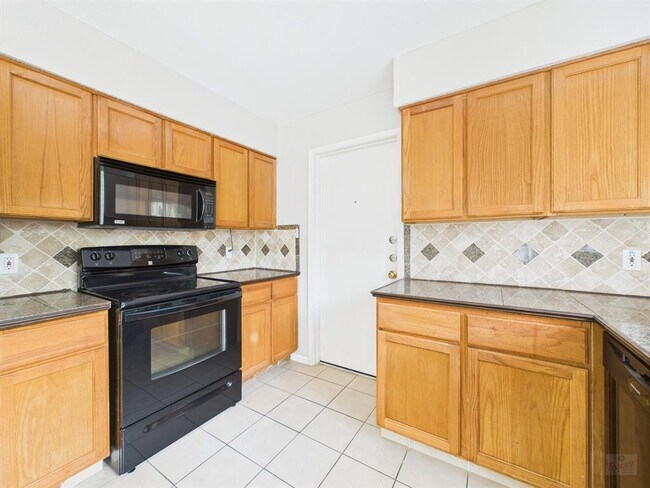 Building Photo - 9520 Quail Village Ln
