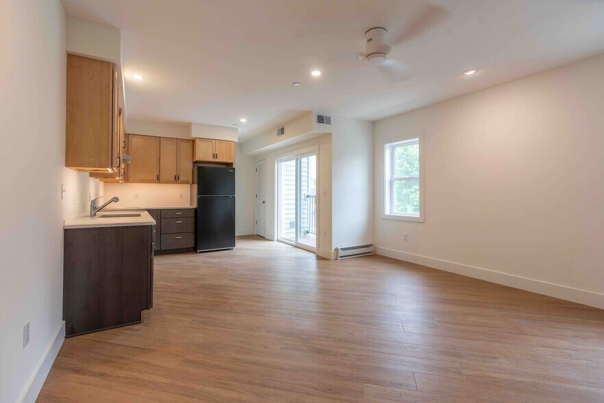 Open Concept Living Area with Balcony - 517 18th St