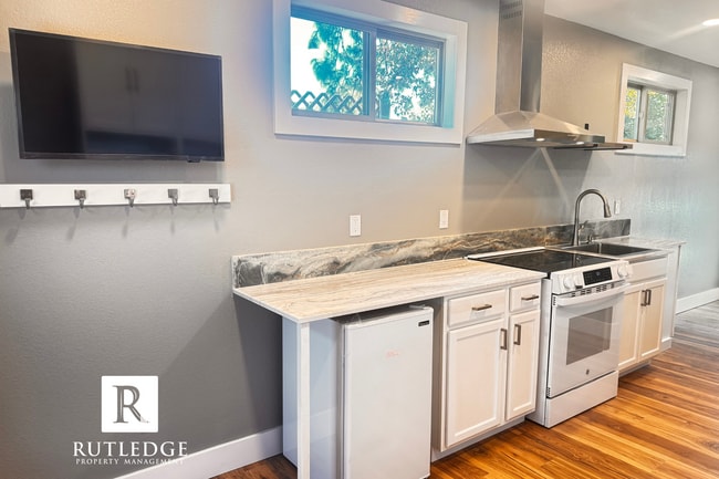 Building Photo - Modern Living / Single Furnished Studio / ...