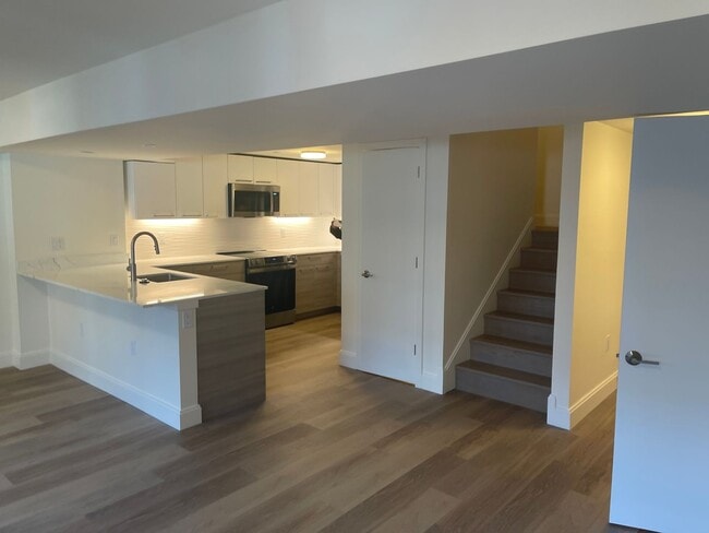 Building Photo - LUXURY 2 BED 2.5 BATH DUPLEX, All New , Laundry in Unit Garage Pool,. NO fee