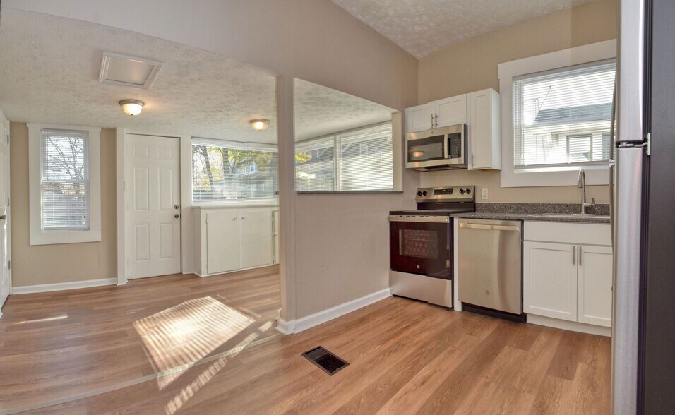 Building Photo - Bates-Hendricks/Newly Remodeled 3 Bedroom Half Double