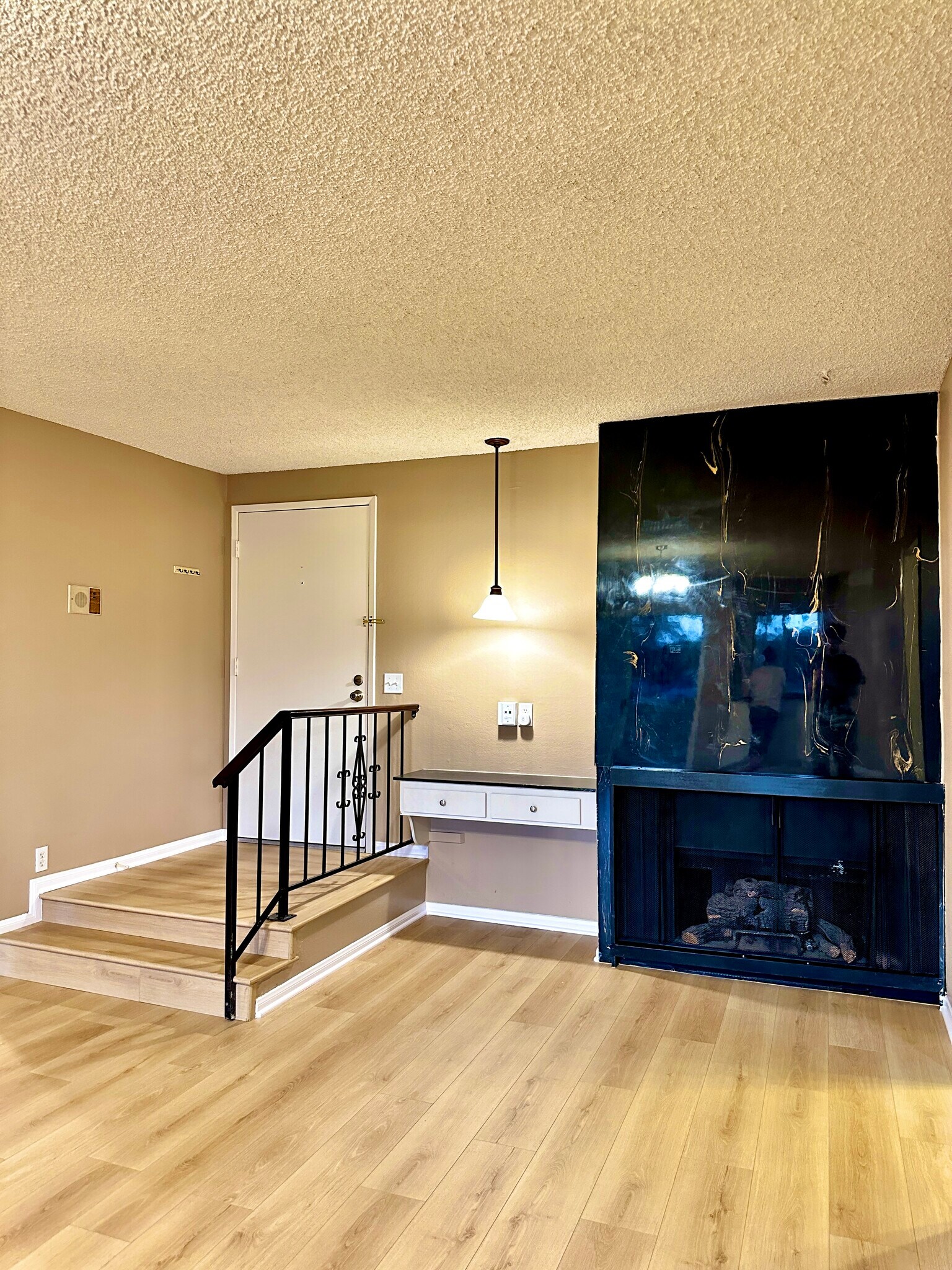 entrance & fireplace - 125 S Sierra Madre Blvd