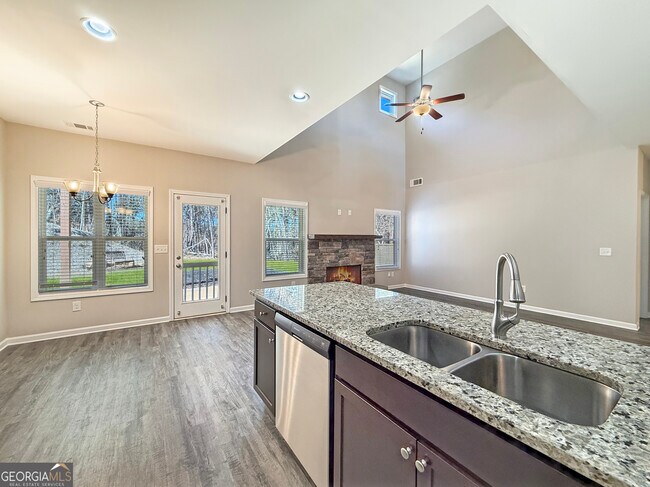 Building Photo - 6369 Woodland Station Dr