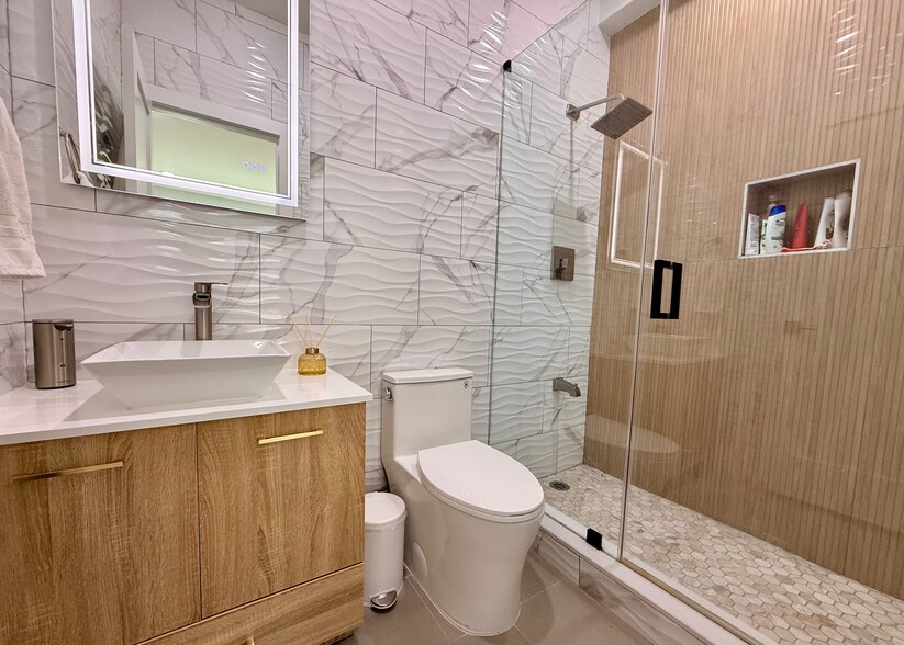 Spa-Inspired En-Suite Bathroom with Rainfall Shower and Floor-to-Ceiling Tile - 443 Bergen Ave