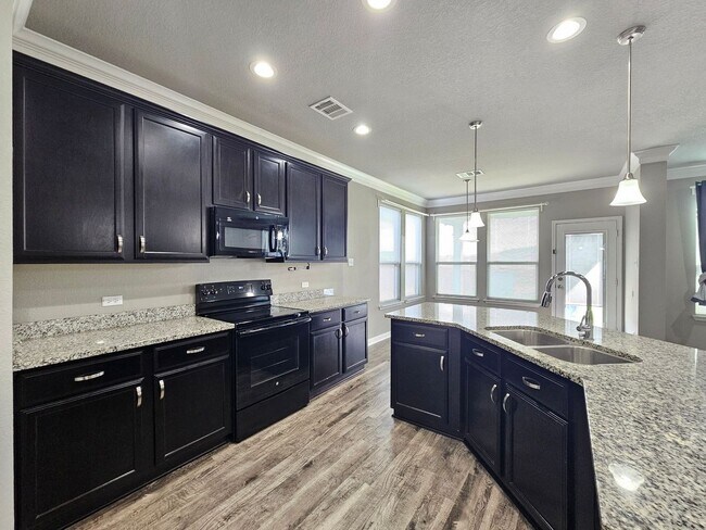 Building Photo - NEW IN MANAGEMENT - AVAILABLE NOW!