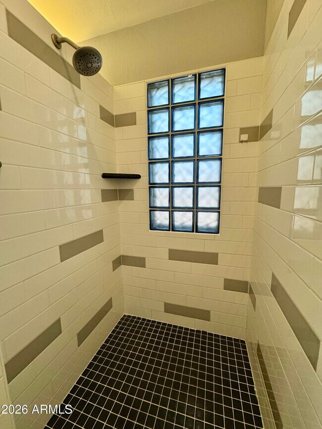 Building Photo - 8667 E Pinchot Ave