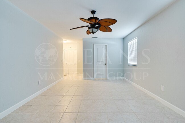 Building Photo - Executive Coastal Retreat | Four-Bedroom P...