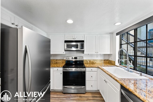 Building Photo - Move-In Ready Laguna Hills Condo | Upgraded Throughout with Private Patio