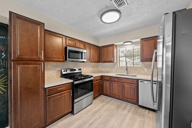 Building Photo - 5826 Spruce Forest Dr