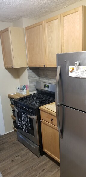 Newly renovated kitchen with gas stove preferred by professional chefs! - 208 NW 3rd St