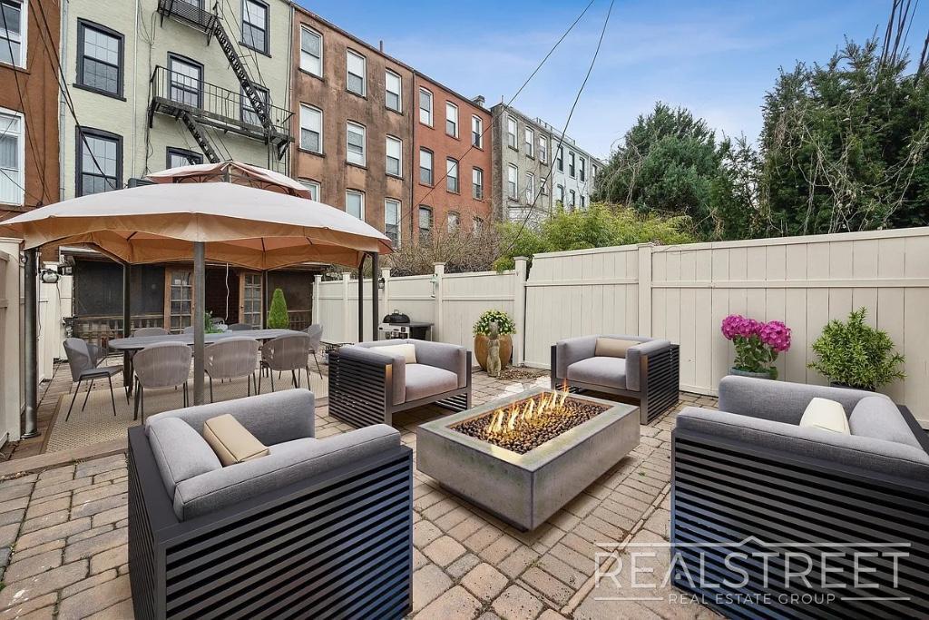 Building Photo - Timelessly Renovated Historic Triplex with...