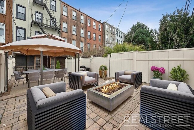Building Photo - Timelessly Renovated Historic Triplex with...