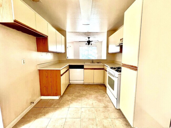 Building Photo - 2-Bedroom, 2-Bath Upstairs Condo Unit in Gated Pomona Community, Water/Trash/HOA Included!