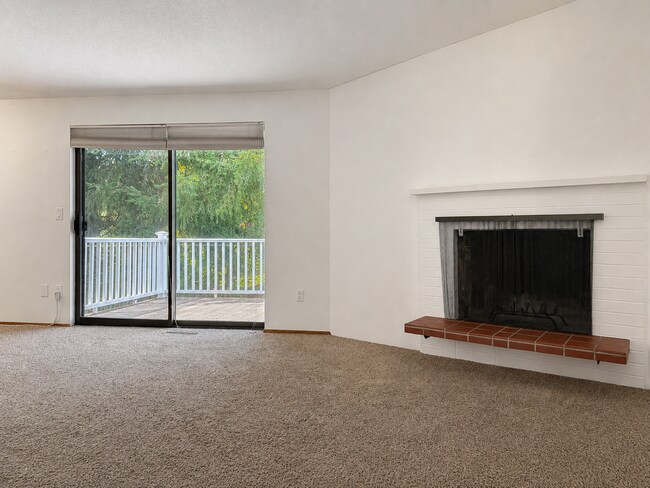 Building Photo - Beautiful Split-Level Home with Fireplace, Deck, Garage, and EV Charger