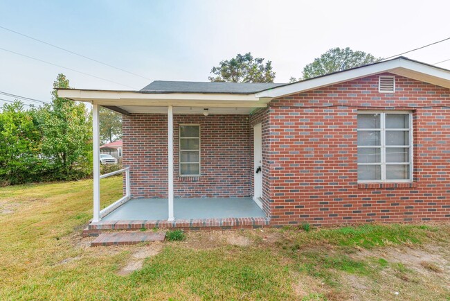 Primary Photo - Brick home with a fenced-in yard!