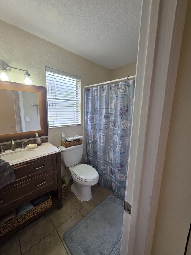 Building Photo - Updated full furnished 2/2 villa in great Safety Harbor location.