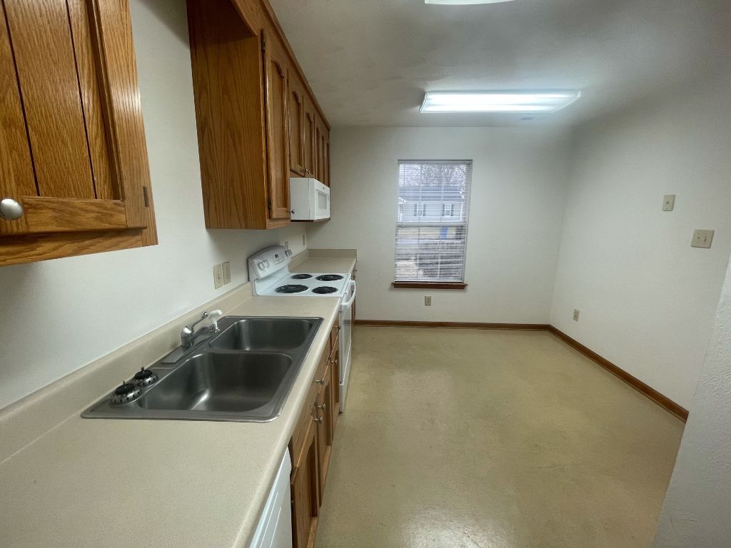 Photo Before New Kitchen Floor - 2066 Iowa St