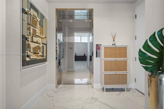 Building Photo - 15701 Collins Ave