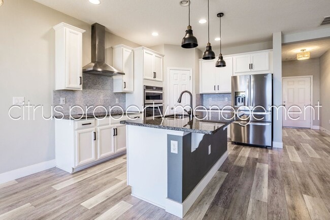 Building Photo - Stunning Double Waterfront 4/3 Home with Dock and Electric Boat Lift