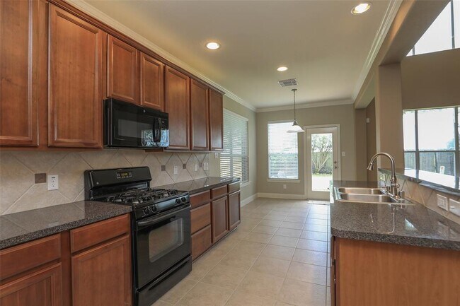 Building Photo - 9603 Red Rugosa Dr