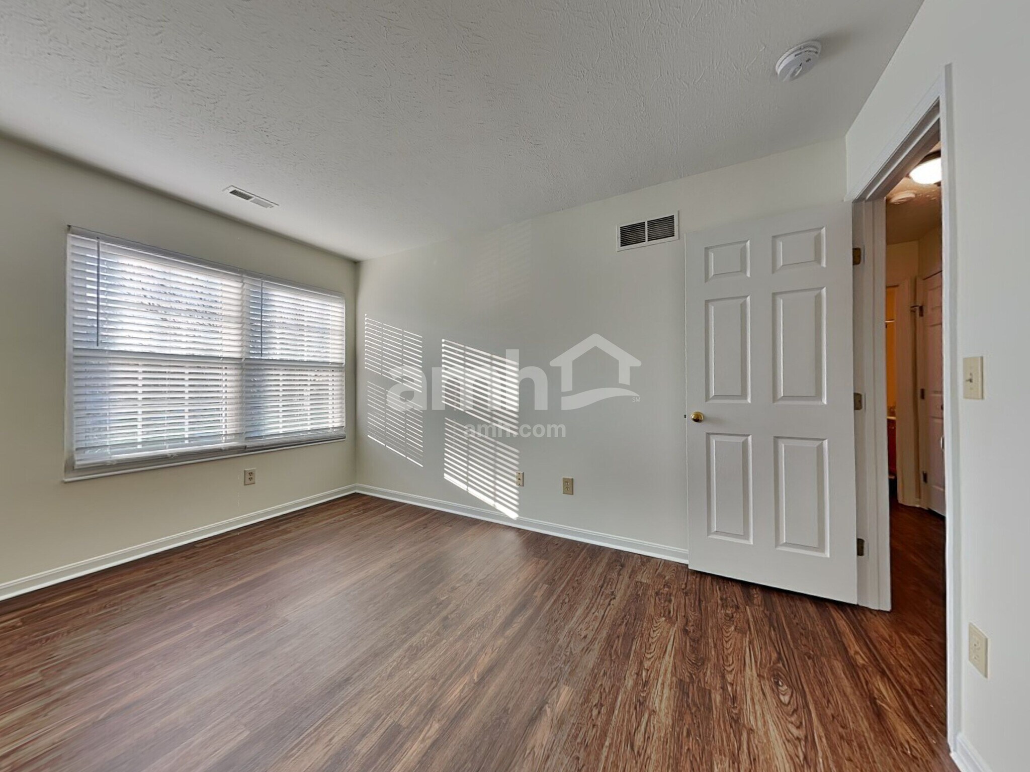 Building Photo - 6312 Satin Wood Dr