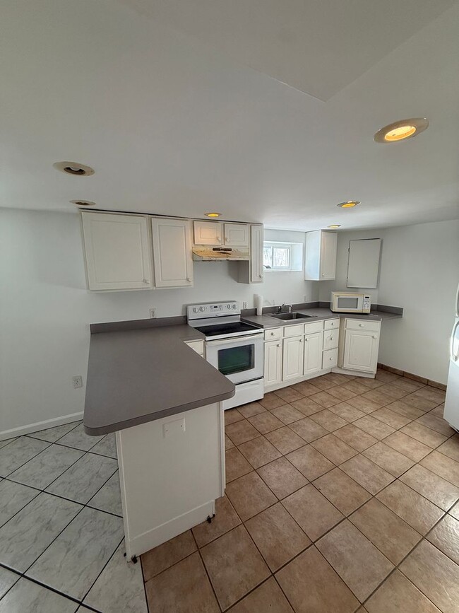 Building Photo - Beautiful 3BR Home with Garage, Finished Walk-Out Basement & Bonus Spaces- Beltsville, MD