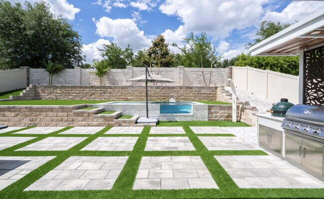 Building Photo - "Spacious 4-Bedroom Retreat with 3 Full Baths in Winter Garden's Serene Sanctuary"