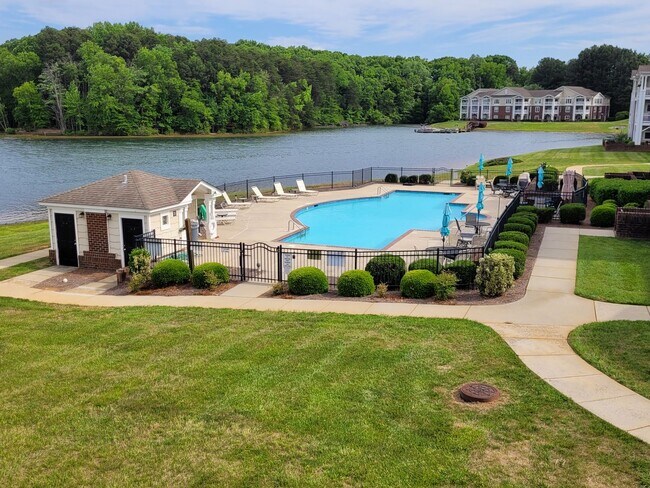 Building Photo - WATERFRONT - 3 Bed/2 Bath Condo - End Unit - Stunning View - Lake Access - Community Pool - Tenni...