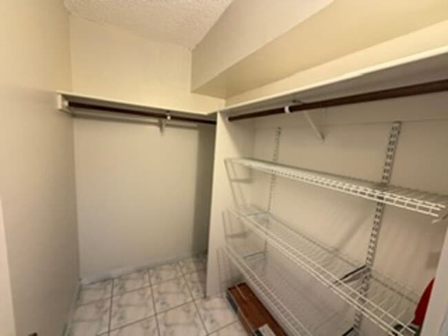 Building Photo - Welcome to your new home at Pearlridge Gardens & Tower! This 1-bedroom, 1-bathroom condo $2,100
