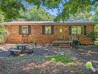 Building Photo - Charming 3BR Home with Covered Parking & Fenced Yard