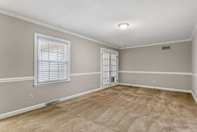 Building Photo - McLeansville - Minutes from Elon & Greensboro! Brick Duplex on a few Acres, Den, SS Appliances, F...