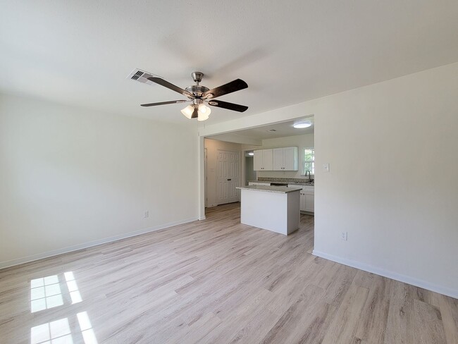 Building Photo - REMODELED 4 BEDROOM 2 BATH LEASE HOME IN A...