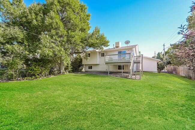 Building Photo - "Charming 4-Bedroom Home with 2 Full Baths...