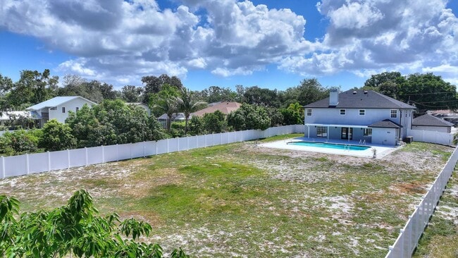Building Photo - Rare Luxury Lease Opportunity | Spectacular 5-Bedroom Pool Estate on Nearly ¾ Acre Near Gulf Beaches