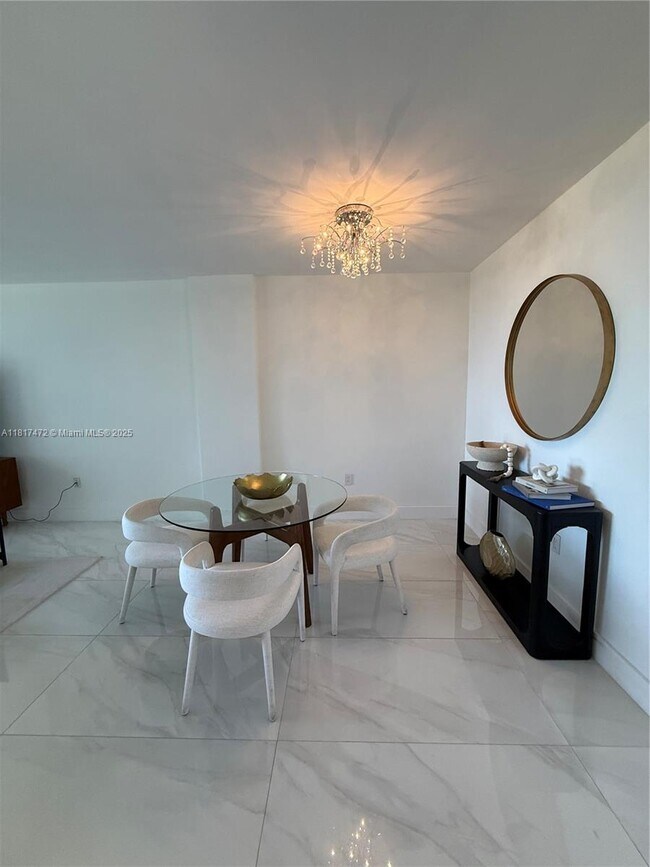 Building Photo - 10275 Collins Ave