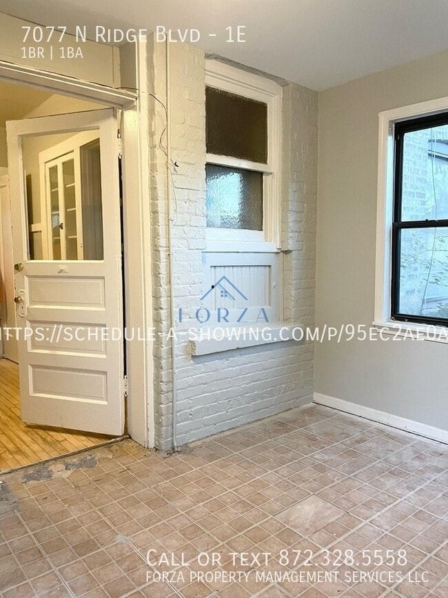 Building Photo - 7077 N Ridge Blvd