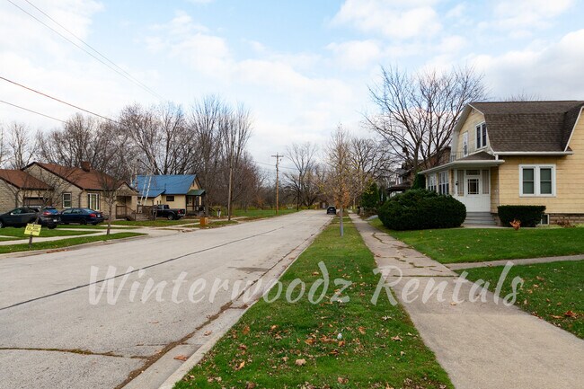 view of street facing the east river - 1432 Porlier St