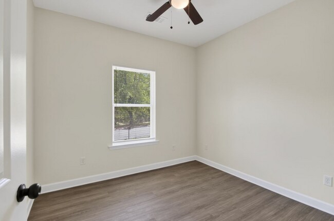Building Photo - Inviting Home with Bright Interiors & Ceiling Fans Throughout - Comfortable Rental with Everyday ...
