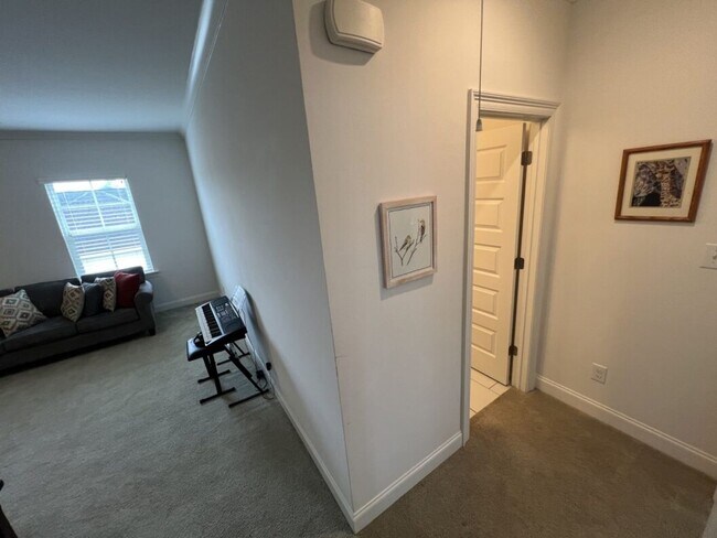 Building Photo - Luxury 4BR Home in Americana | 11 Ft Ceilings, Courtyard Living & Furnished Option