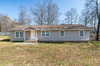 Building Photo - Move-In Ready 4BR with Renovated Interiors...