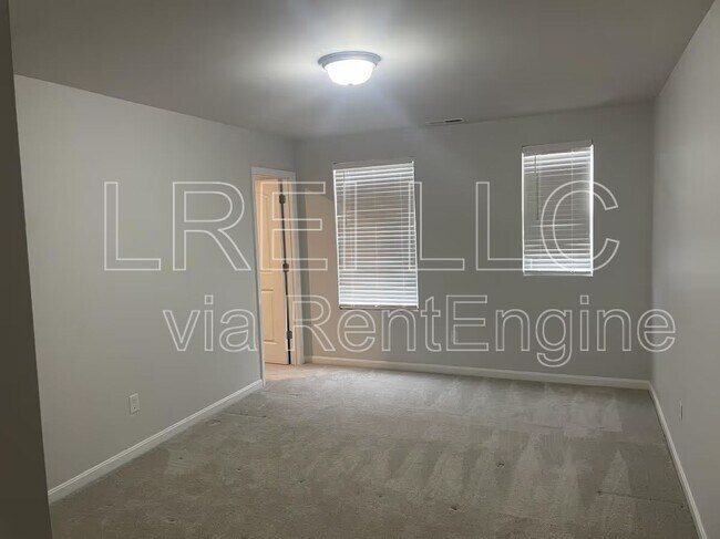 Building Photo - 9211 Tamarack Grove Ln