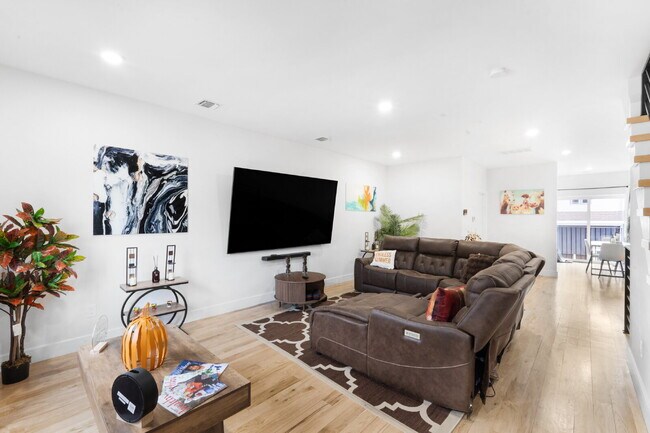 Building Photo - Movie in special, first 1/2 month rent is FREE! Charming 2-Bedroom Condo with 2 Full & 2 Half Bat...